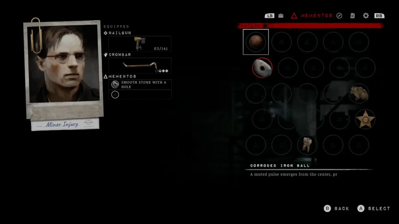Mementos menu showing Smooth Stone with a Hole equipped and an additional empty equipment slot